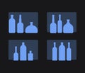 set of alcoholic drinks bottles on black background